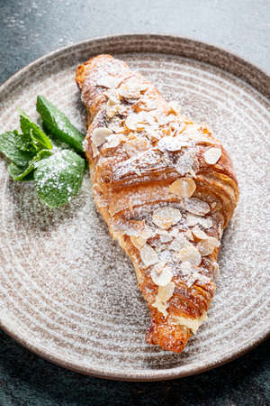 almond croissant with mint, top viewの写真素材