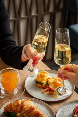 woman drinking champagne in the restaurant