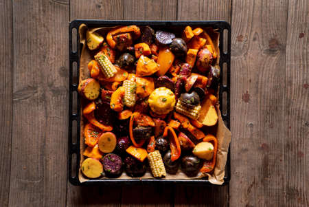 roasted vegetables with herbs and spicesの写真素材