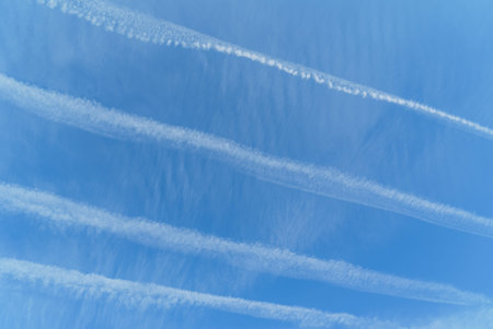 Beautiful blue sky with white clouds and sunlight.