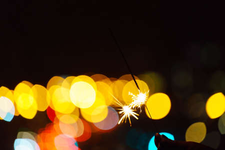 holiday sparkler on the black backgroundの写真素材
