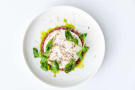 beef tartare with sauce and herbsの写真素材