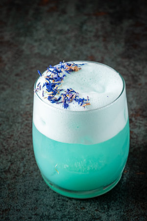 tasty cocktail with edible flowerの写真素材