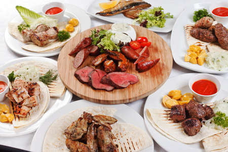 party with tasty dishes on Christmas tableの写真素材