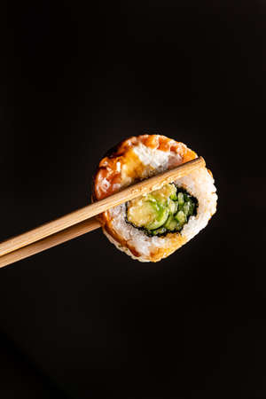tasty sushi with fresh fish and vegetablesの写真素材