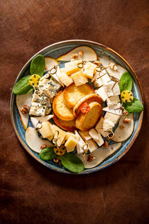 cheese plate on the Christmas tableの写真素材