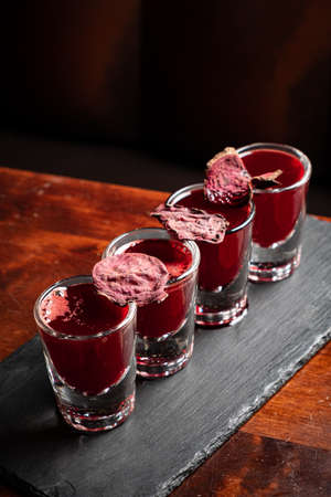 cranberry shots in the barの写真素材