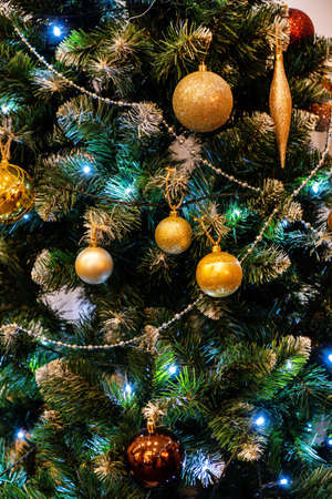 Christmas tree with golden and red ballsの写真素材