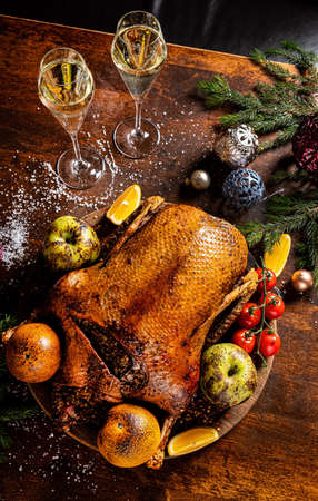 Christmas turkey on teh wooden tableの写真素材