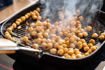 roasted chickpeas on the panの写真素材