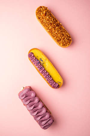 french eclairs on the pink backgroundの写真素材