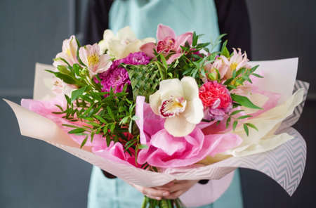 nice flowers in the handsの写真素材
