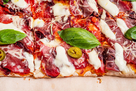 italian pizza on the wooden boardの写真素材