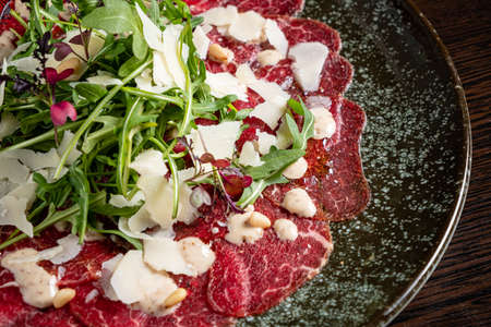 carpaccio with arugula saladの写真素材