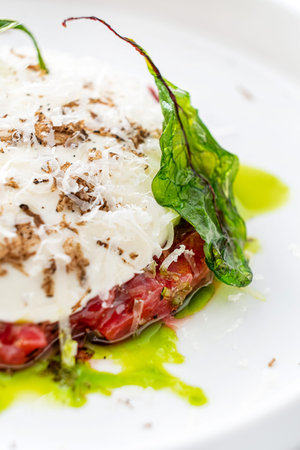 Tartar or beef tartar diet with capers, shallots and chives