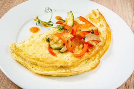 omelet with fresh vegetables, top viewの写真素材