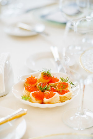 canape with caviar on catering tableの写真素材