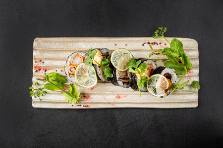 creative sushi on the black stone