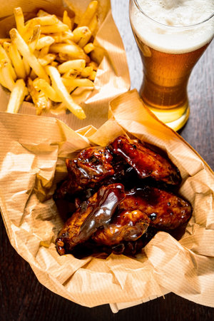 french fries with chicken and sauce