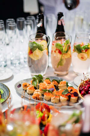 catering food and drinks on the tableの写真素材