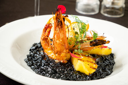 Cooked black rice with shrimpsの写真素材