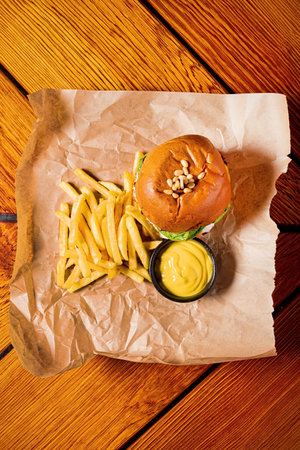 tasty burger with french fries