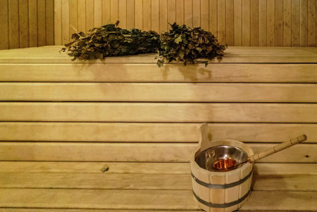 Interior details Finnish sauna steam room with traditional sauna accessoriesの写真素材