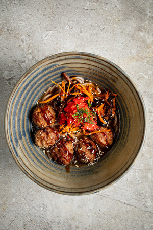 meatballs with soba in the bowlの写真素材