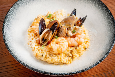 seafood risotto on the wooden backgroundの写真素材