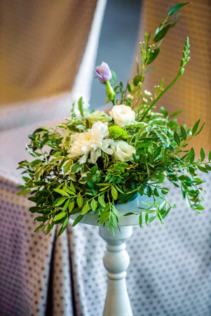 wedding bouquet with leaves and ribbonsの写真素材