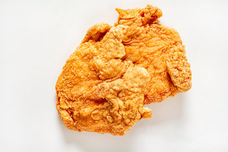 fried breaded chicken on the whiteの写真素材