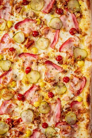 pizza with ham and picklesの写真素材