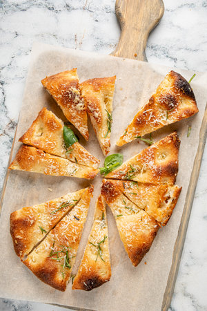 tasty pizza on the wooden boardの写真素材