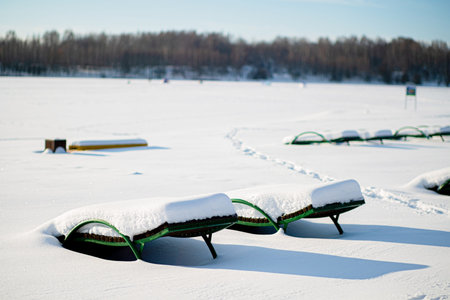 Empty beach at the abandoned frozen lake