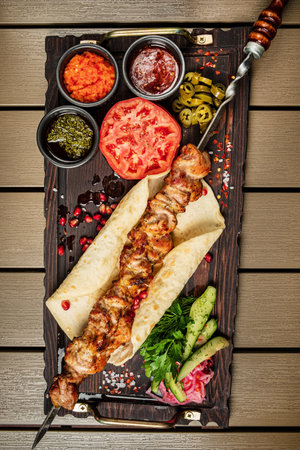 Grilled Lula kebab lamb with sauce.の写真素材