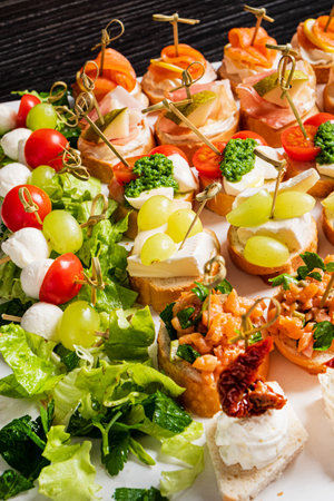 different appetizers on the catering tableの写真素材