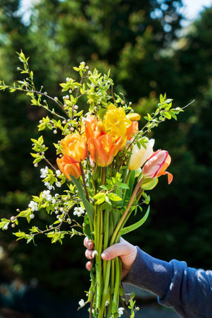 spring bouquet in the white handsの写真素材