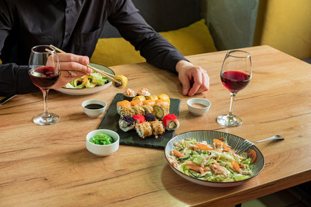 friends eating sushi in cafe