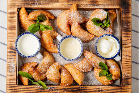 fried pies with cherry and mintの写真素材