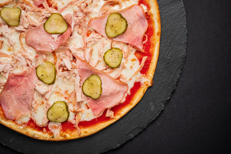 pizza on the black backgroundの写真素材