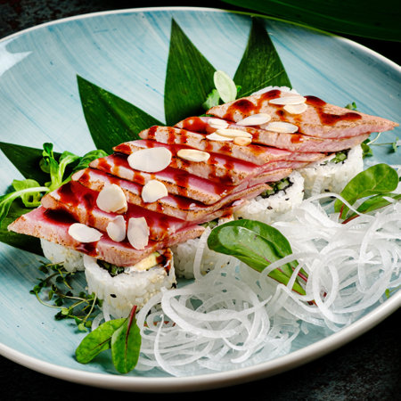 Japanese salmon fish fillet glazed in teriyaki sauce with avocado.の写真素材