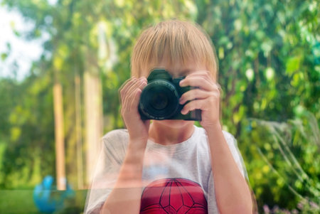 boy making selfie on cameraの写真素材