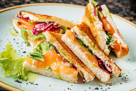 tasty sandwiches with ham and fishの写真素材