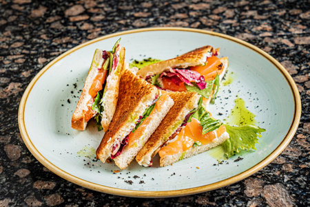 tasty sandwiches with ham and fishの写真素材