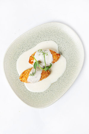 fresh cutlets with cream sauceの写真素材