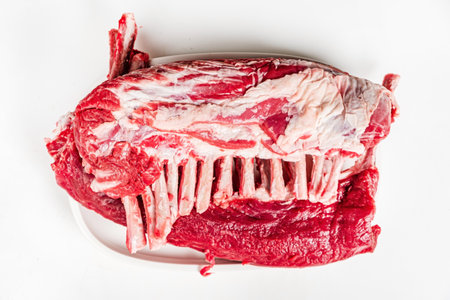 Raw rack of lamb on the whiteの写真素材