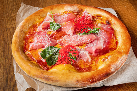 italian pizza on the wooden backgroundの写真素材