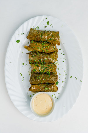 Stuffed grape leaves in a plate