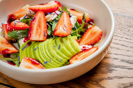 salad with fresh strawberry and avocado