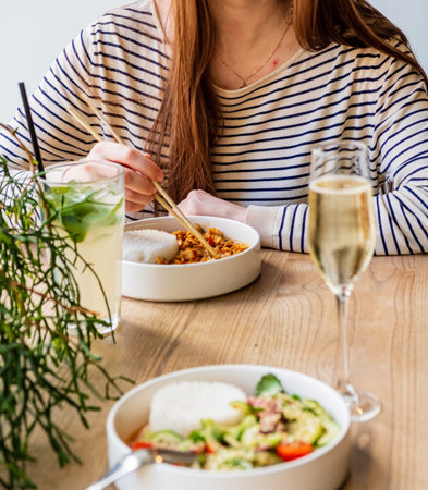 woman eating in the asian cafe